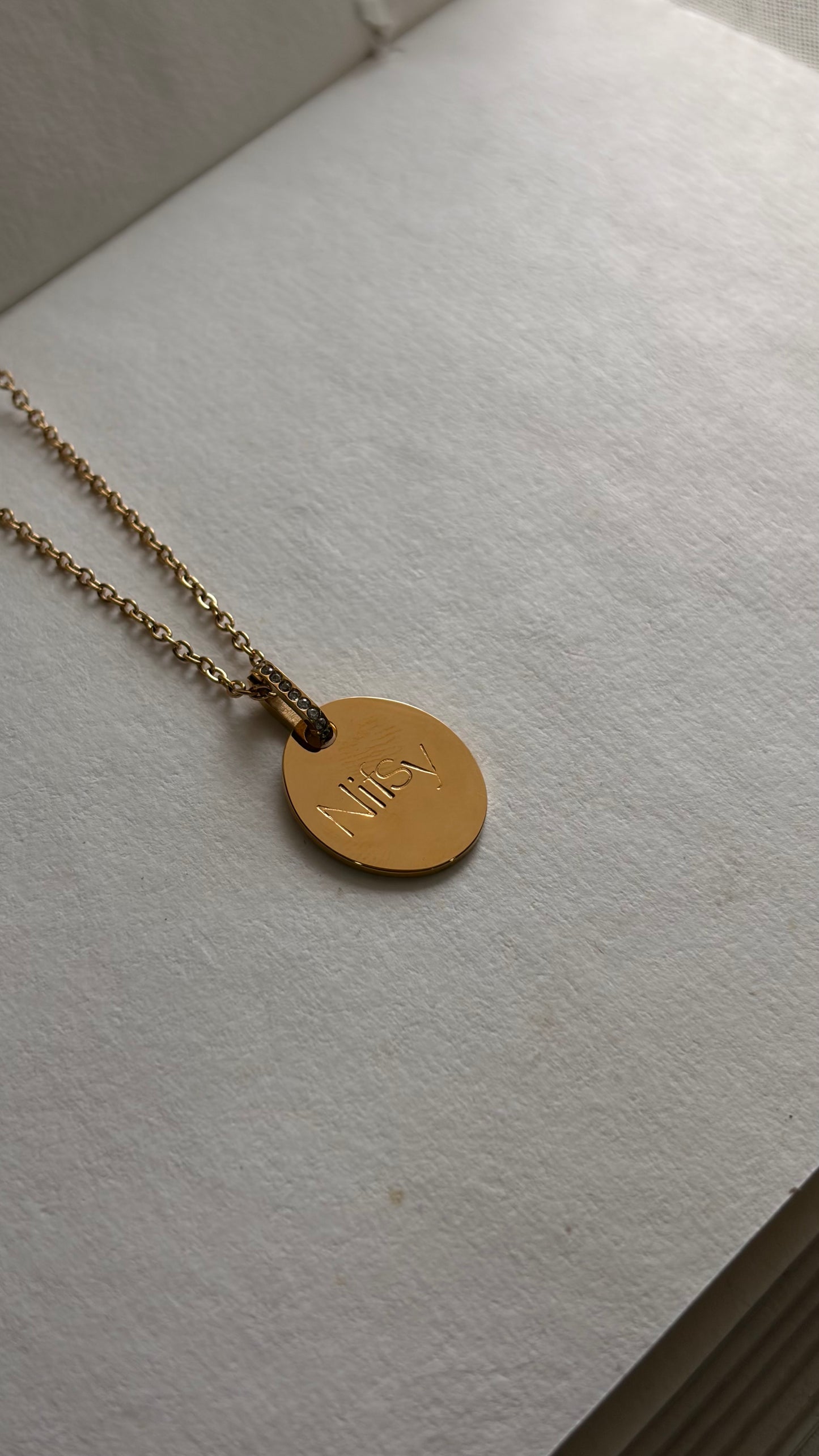 Oval affirmation pendant