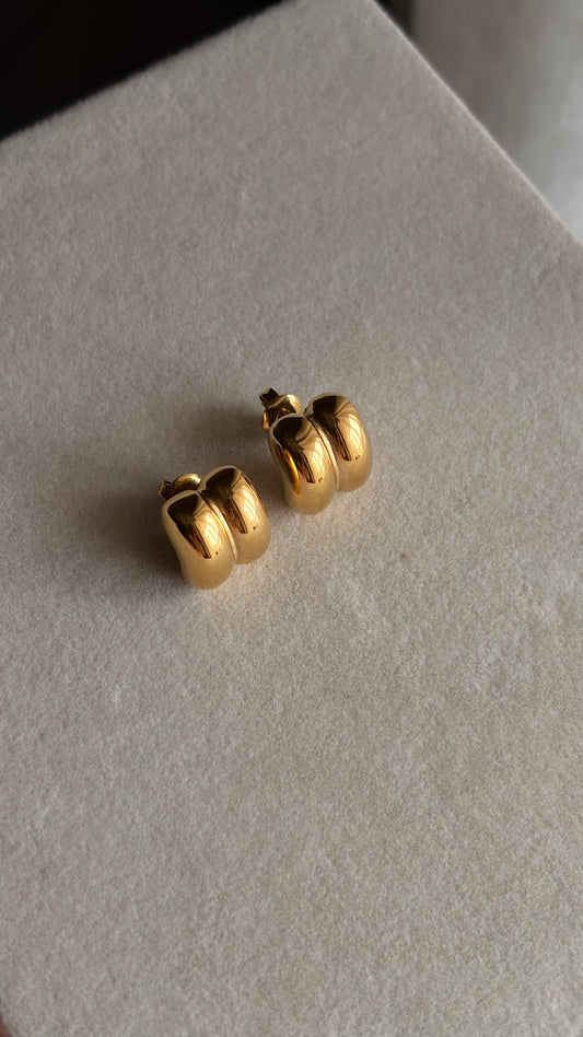 Gold buns stud earrings